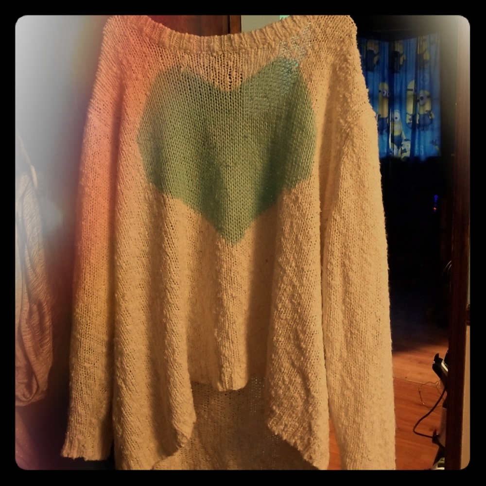 A green heart sweater